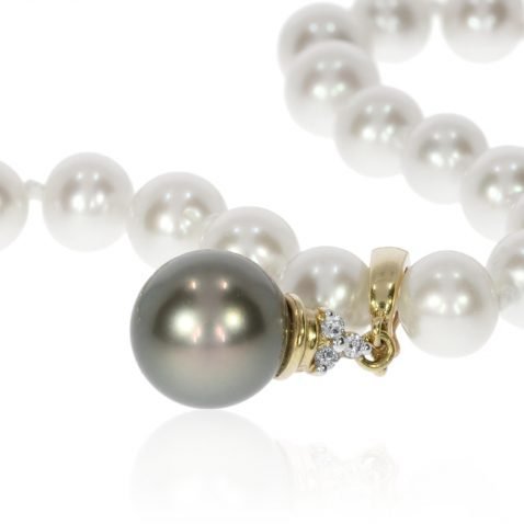 Tahitian Pearl and Diamond Enhancer P875 on Pearls