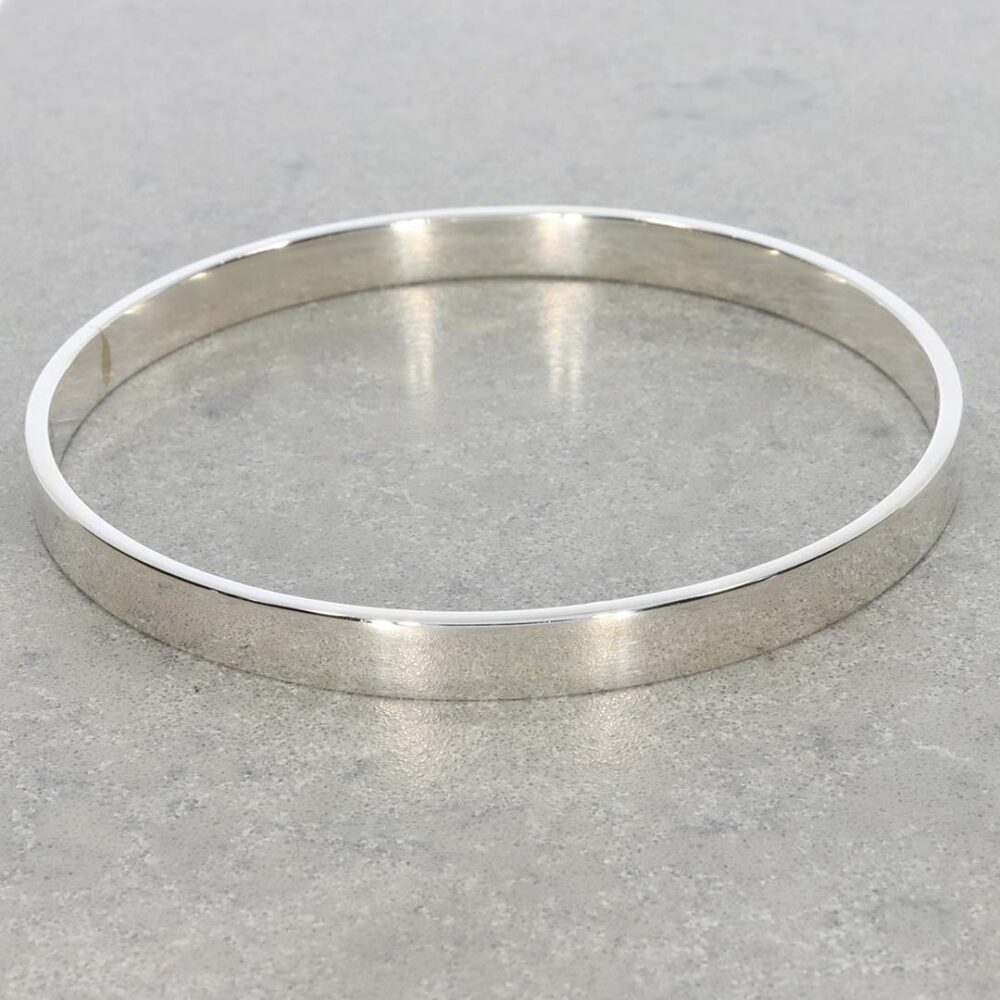 Sara Flat Silver Bangle Heidi Kjeldsen Jewellers BL1284 still