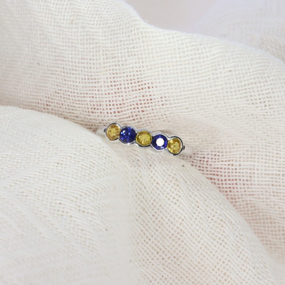Yellow and blue natural sapphire five stone ring by Heidi Kjeldsen R1525 white