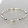 Tove Gold Silver Kiss Bangle Heidi Kjeldsen Jewellers BL1396 still