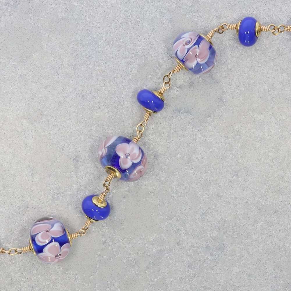 Heidi Blue Floral Glass and Heidi Kjeldsen Jewellers NL1319 still