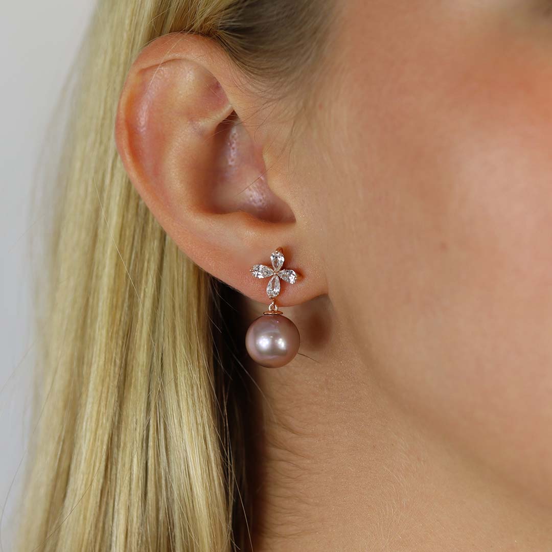A pair of Pink Pearls (approx. 11.5mm) and marquise cut Diamonds (total approx. 1.18cts) in 18ct rose Gold earrings, from the Jesper collection.