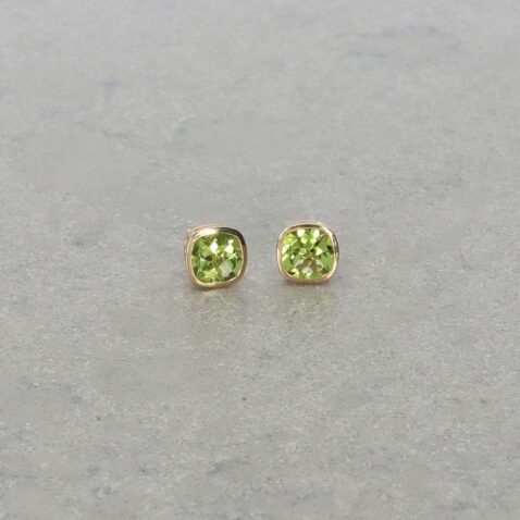 Nanna Peridot and Yellow Gold Rubover Set Earrings Heidi Kjeldsen Jewellery ER6028 still